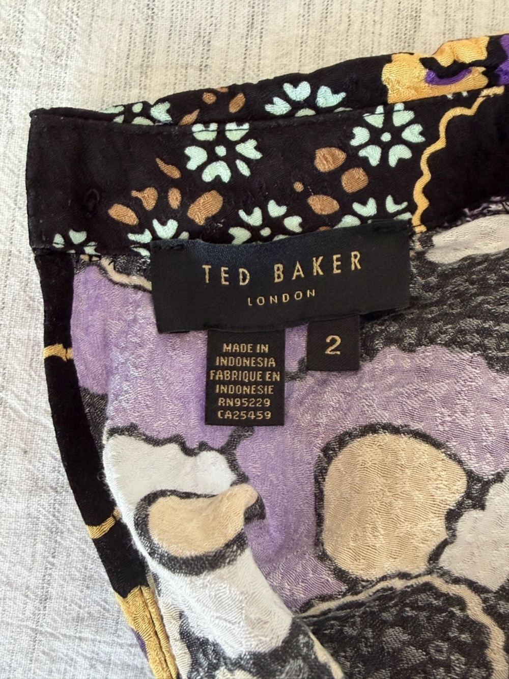Ted Baker Black Floral-Print High Neck Mini Dress with Purple Accents - Picture 8 of 10